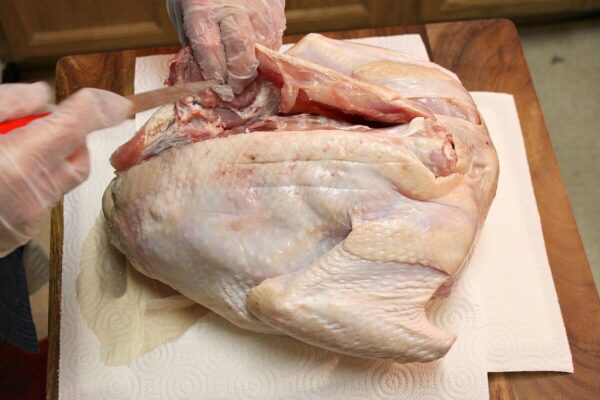 Process to debone a whole turkey.