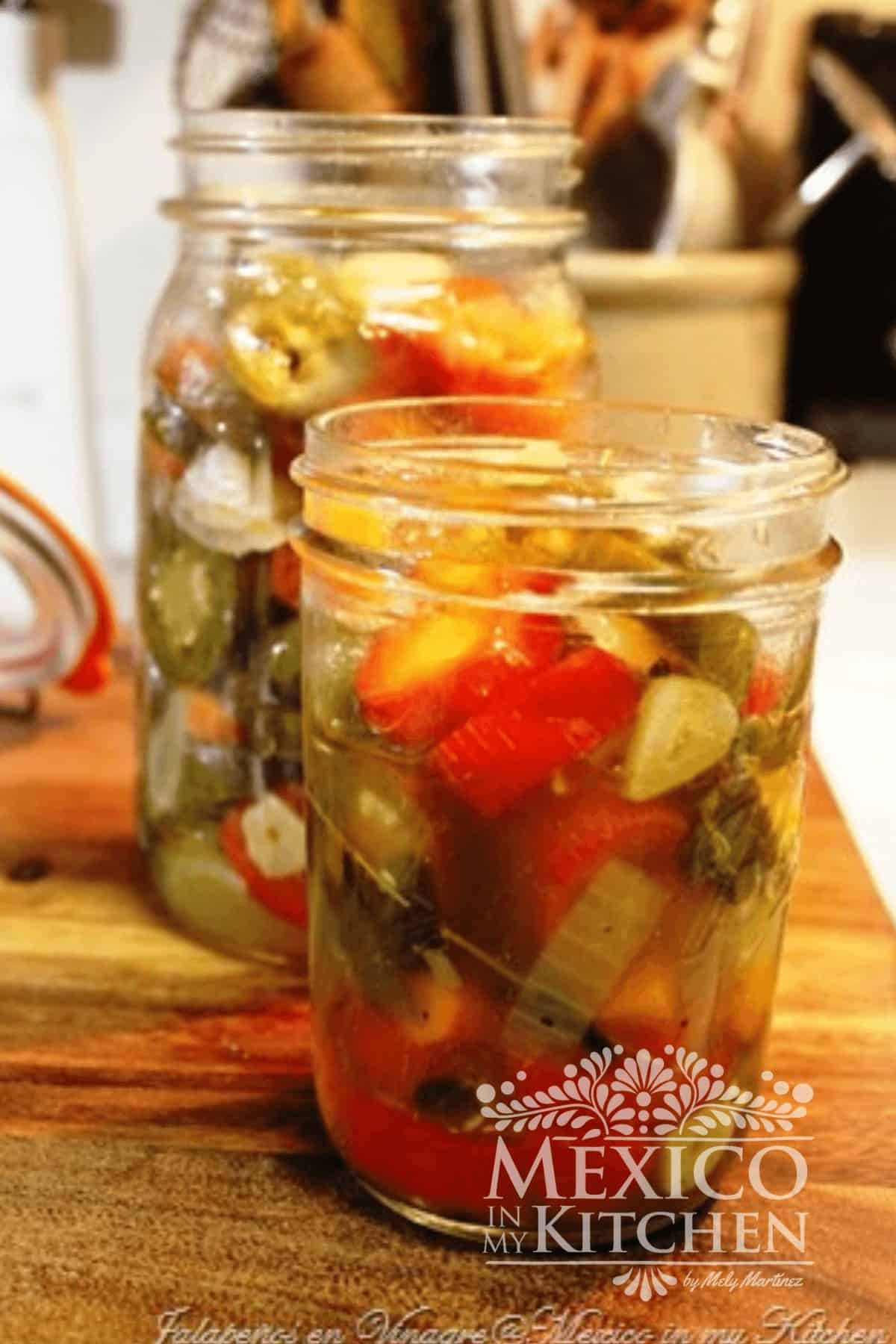 Pickled jalapeños in a jar.