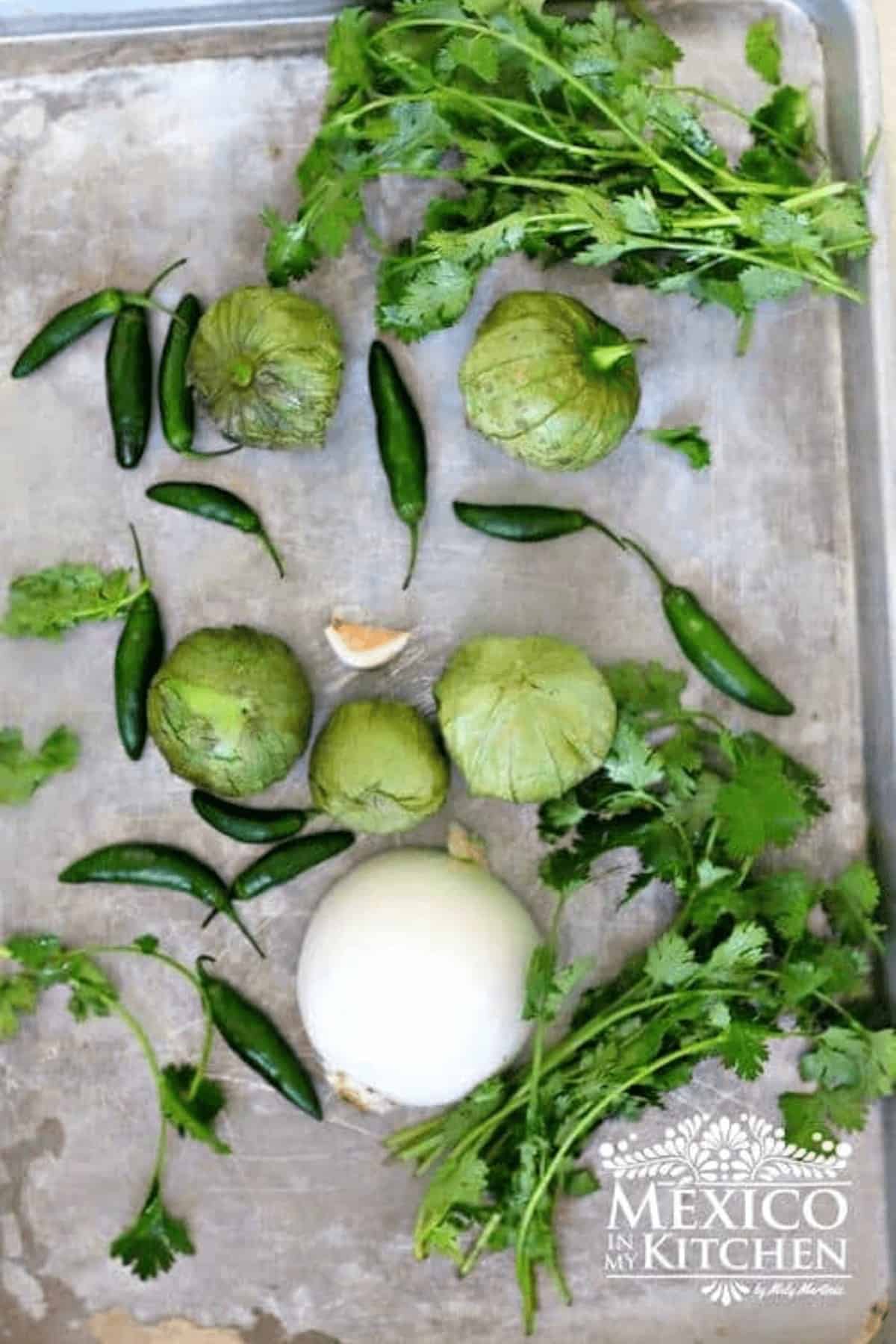 Ingredients to make a salsa verde on a tray