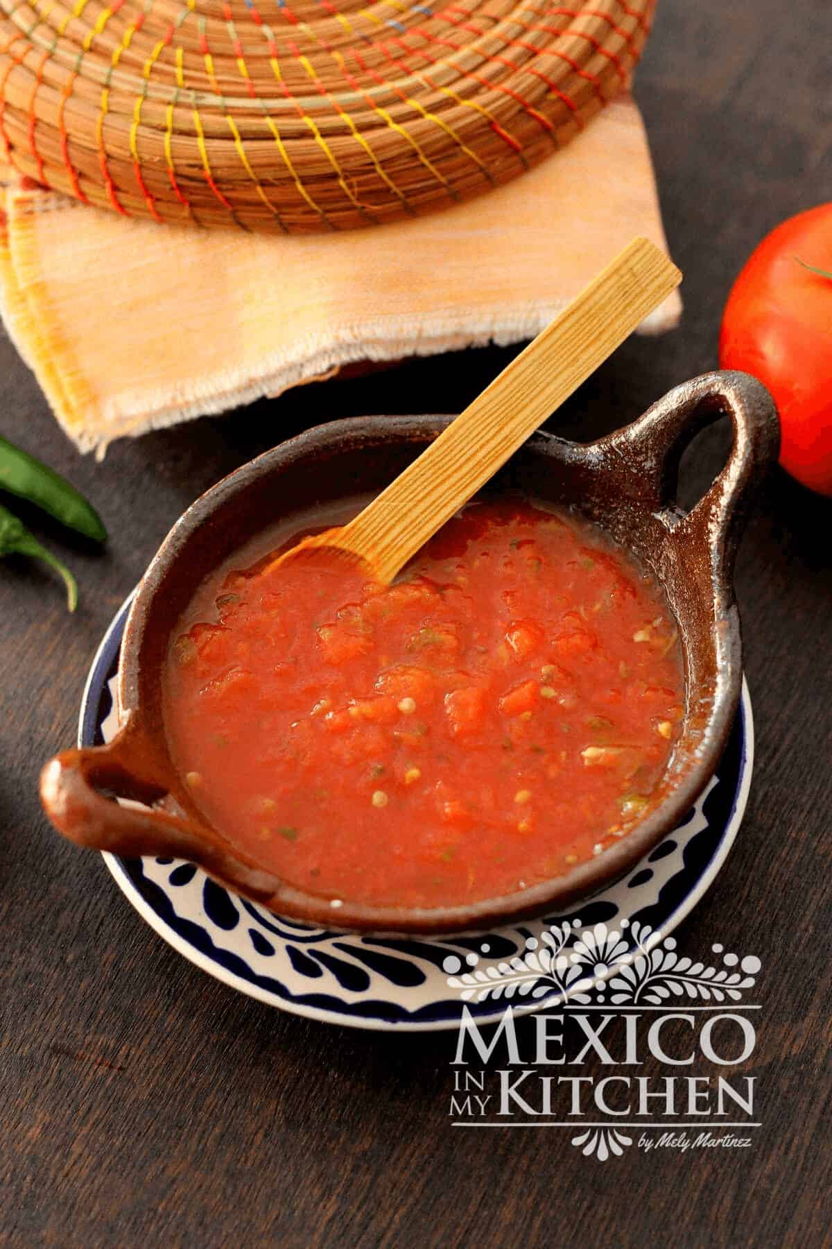 Mexican salsa roja serve in a bowl.