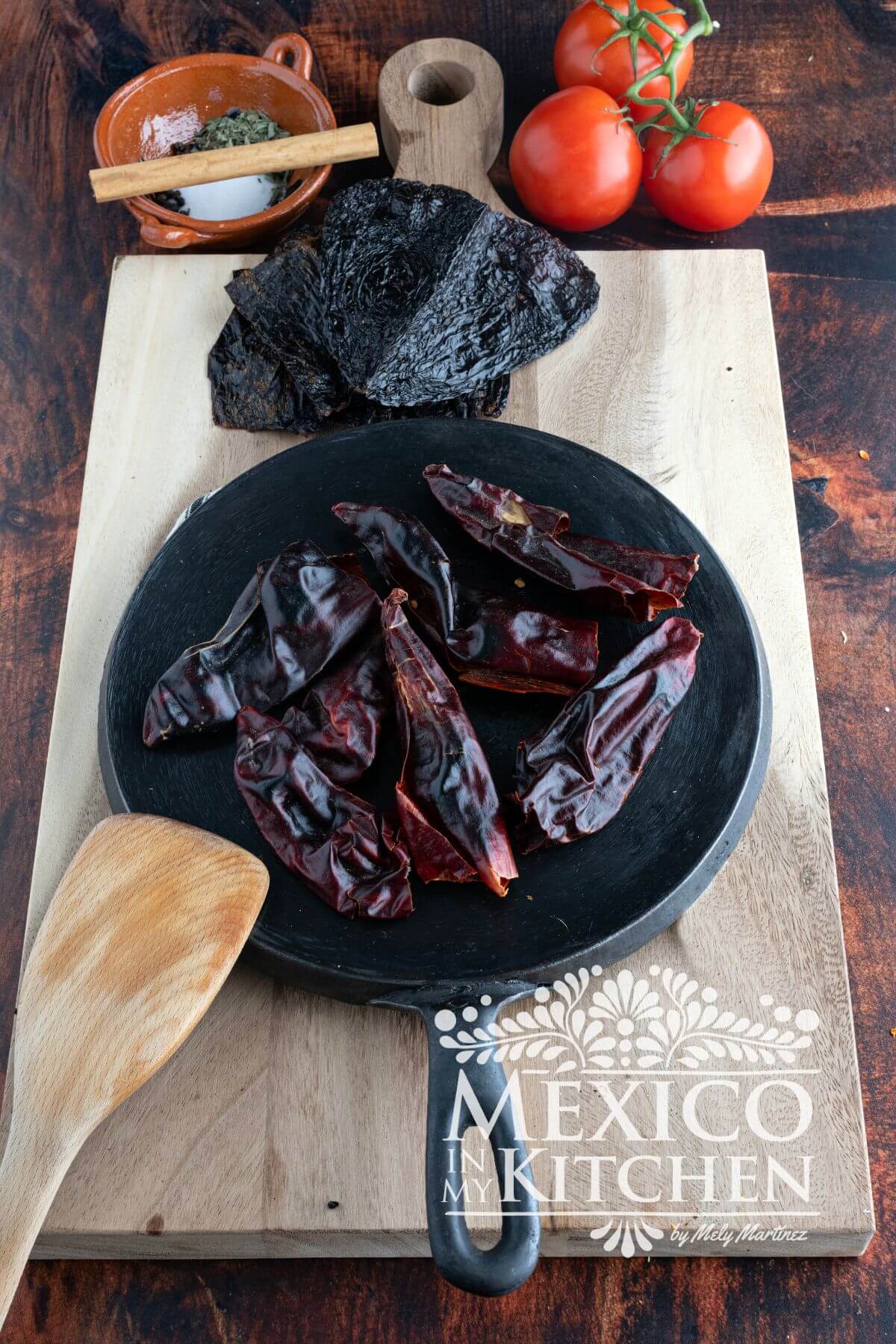 Roasting dried chiles in an cast iron pan "comal"