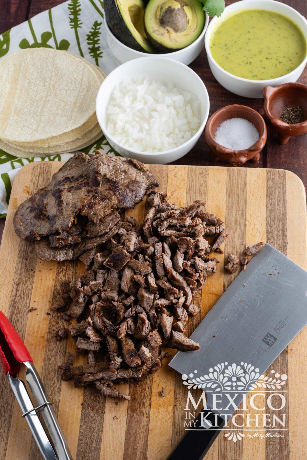 Chopped steak on a cutting board.