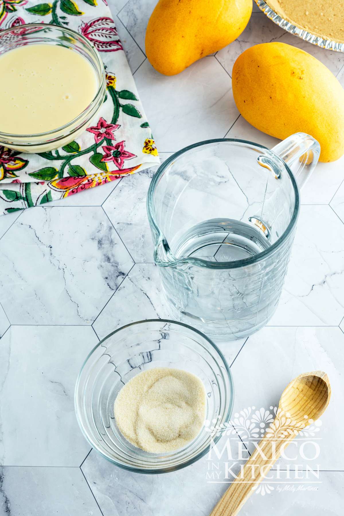 Gelatin powder next to water