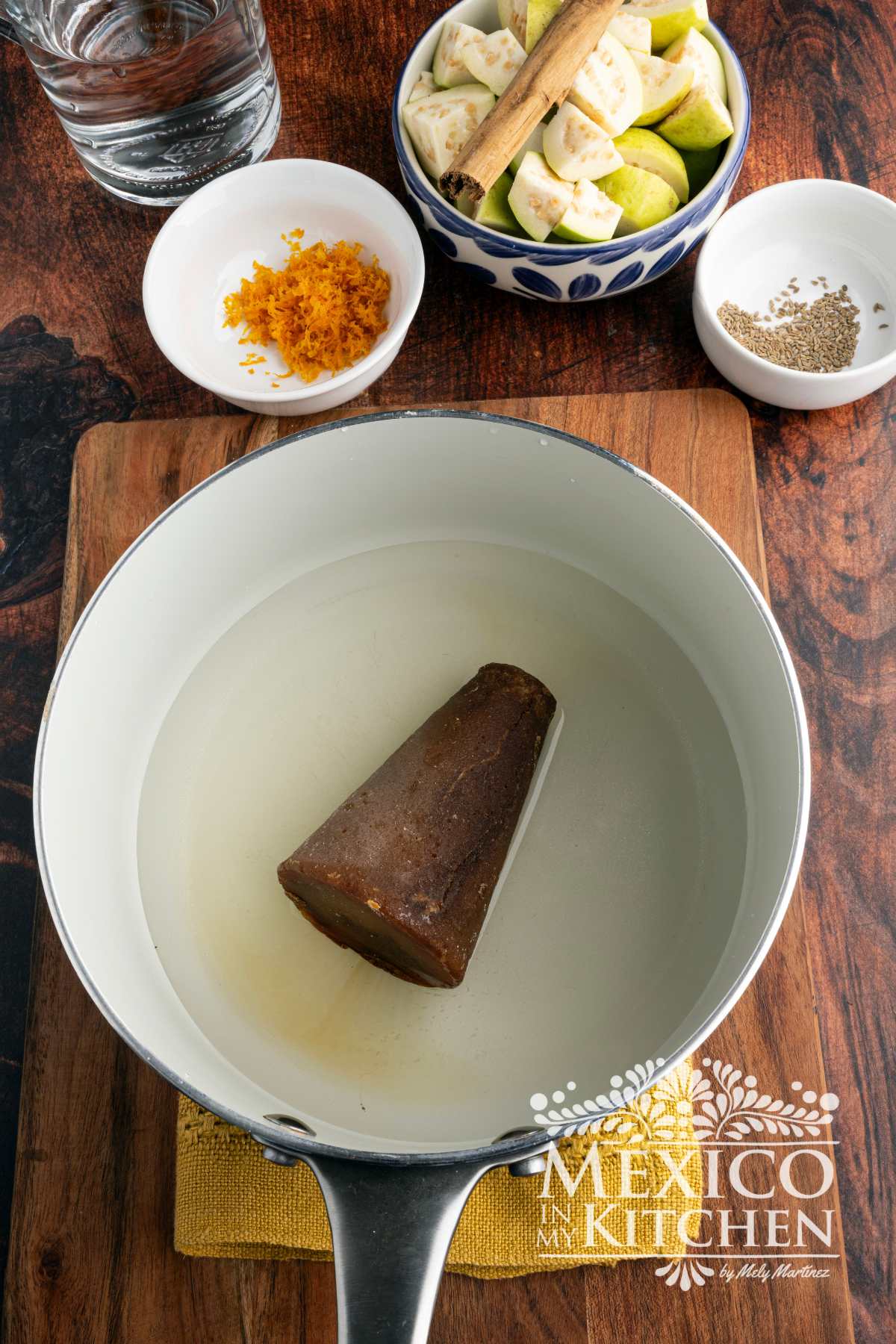 Piloncillo with water in a sauce pot.