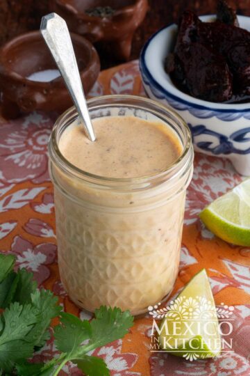 Creamy Fish Taco Sauce in a glass container.