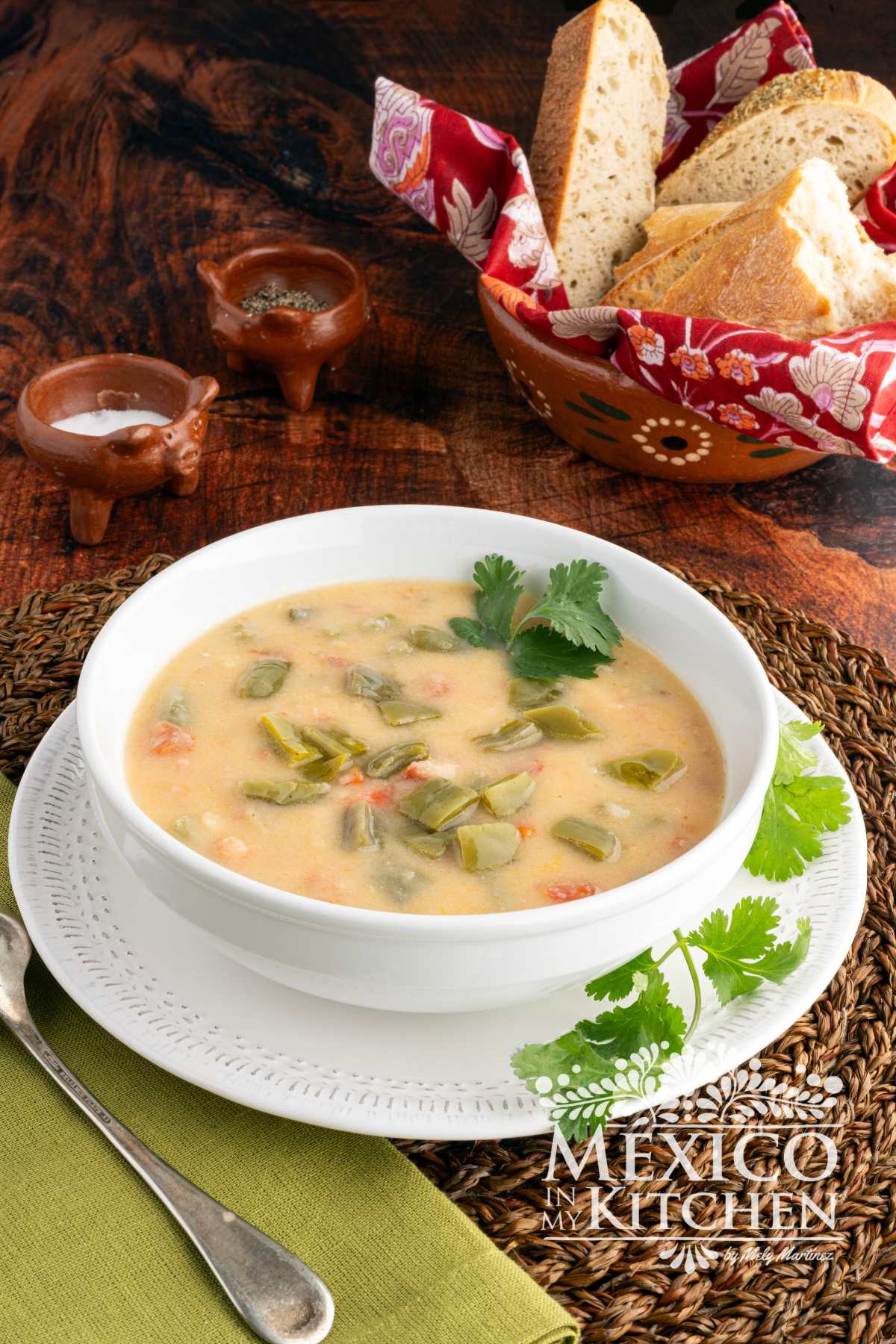 Mexican Fava bean soup (sopa de habas) serve in a white bowl.