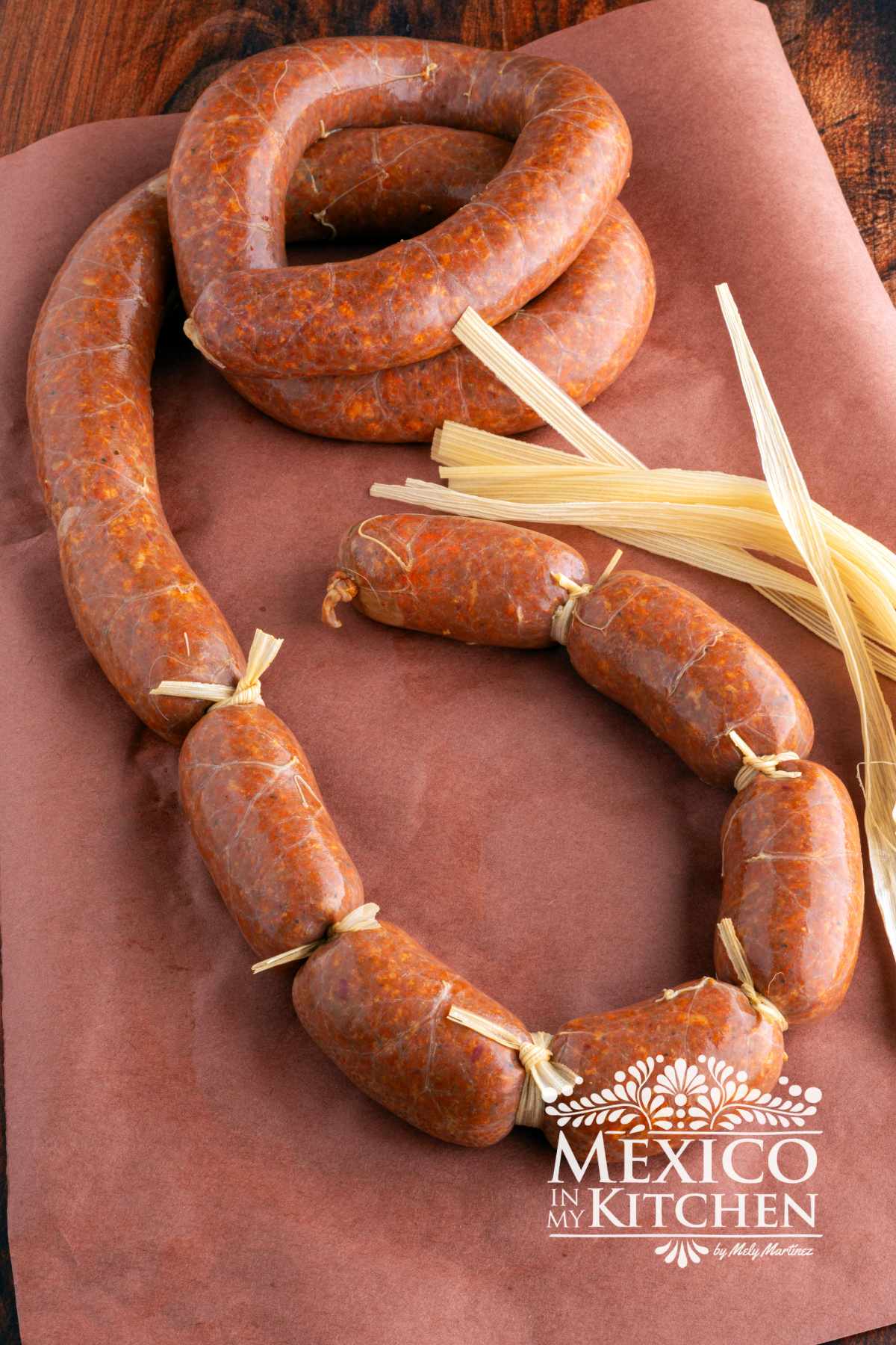 Mexican chorizo in casing, tied with stings of corn husks.